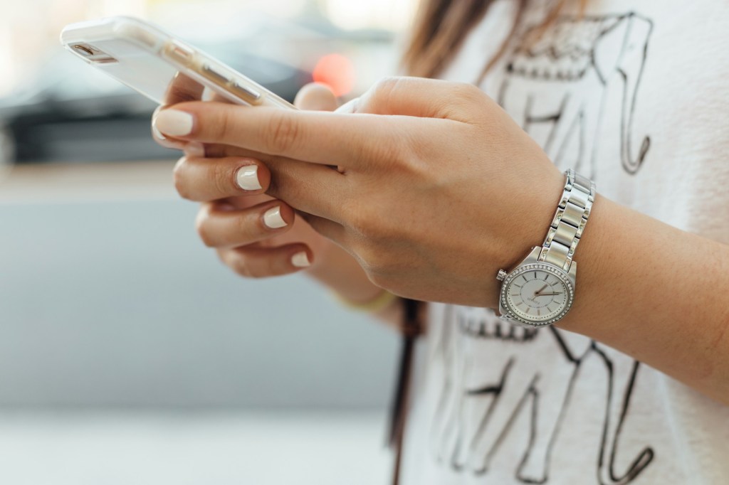 woman holding mobile phone