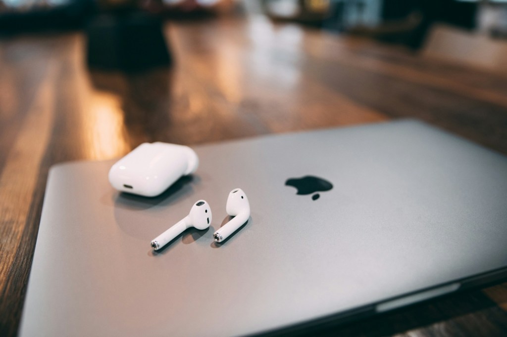 air pods on top of a Mac